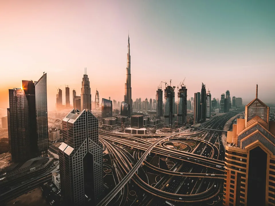 The Dubai skyline and Burj Khalifa at sunrise